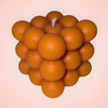 Bright orange bubble cube candle with modern geometric design, hand-poured soy wax, perfect for contemporary home décor and vibrant accents.