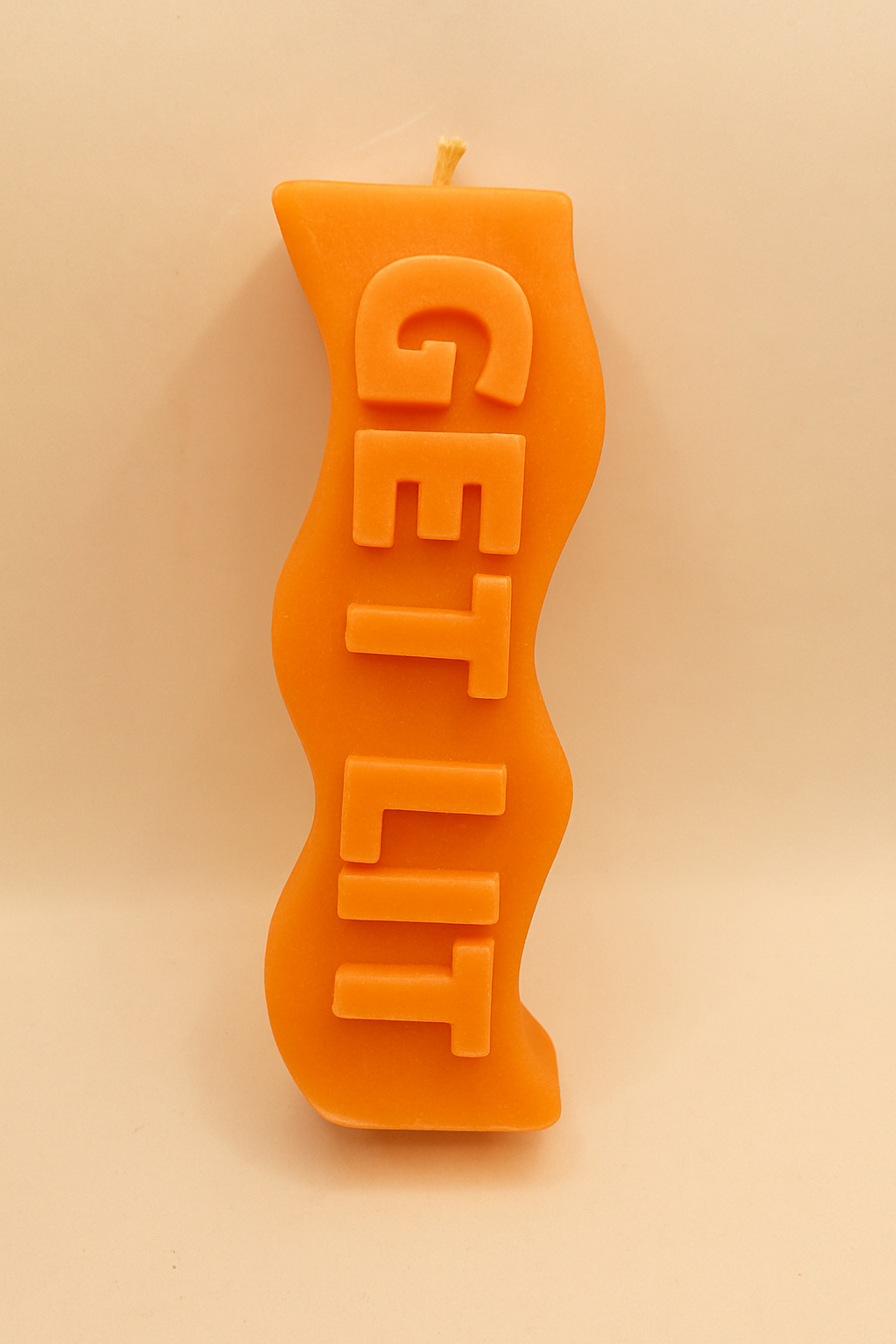 Orange Get Lit Candle with vibrant orange color and Citrus Mango scent, energizing decorative candle with playful quote