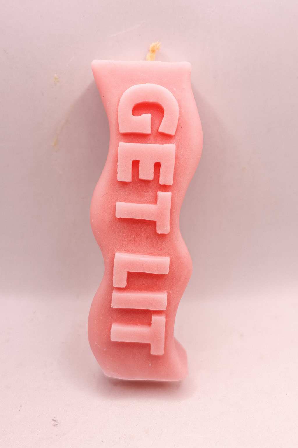 Pink Get Lit Candle with sassy quote and rose strawberry scent in vibrant pink color