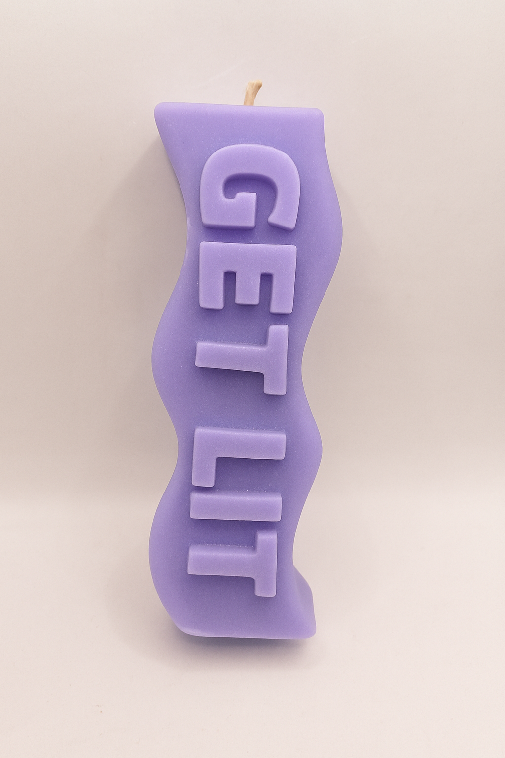 Purple Get Lit Candle with bold “Get Lit” slogan and lavender vanilla scent