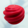 Hand-poured Red Swirl Candle with vibrant red swirl design and long-lasting soy wax burn