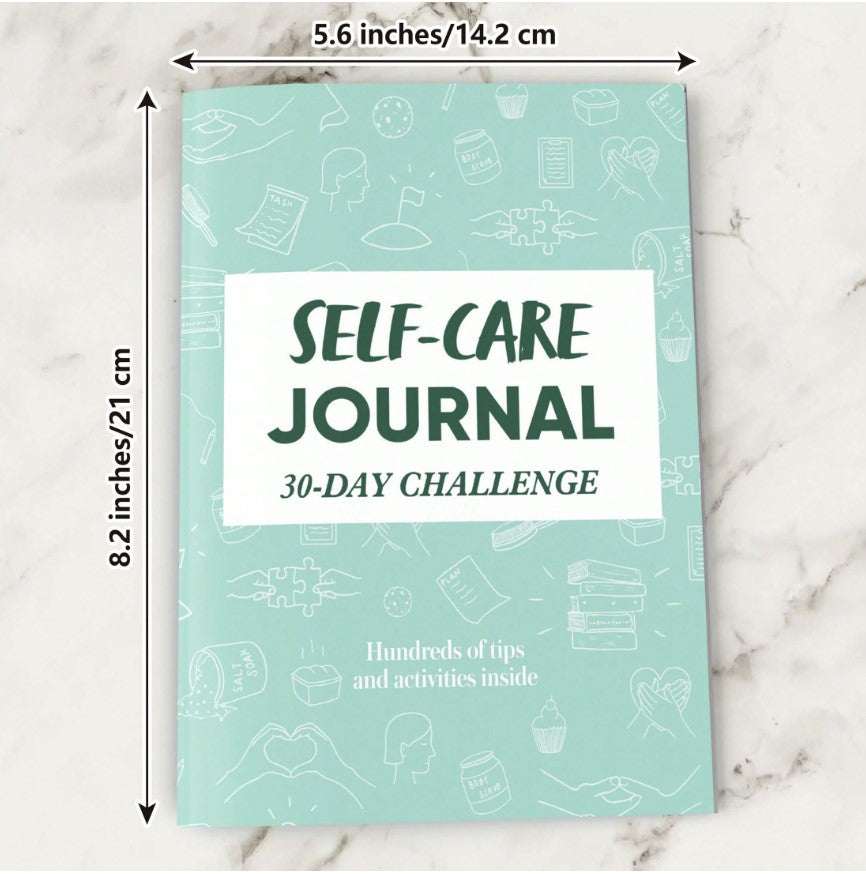 Self-Care Bundle Box with journal, affirmation pen, bath bombs, candle, and calming tea for relaxation and mindfulness