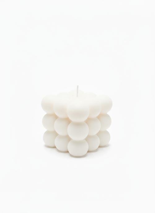 Modern Bubble Cube Candle with raised bubble design in purple, white, and green soy wax options